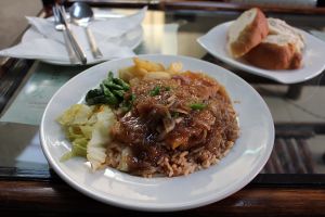 Rice with fried tofu, seasonal vegetables, sauce, chillies. at Loving Hut in Addis Ababa