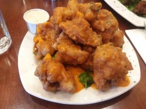 new Buffalo cauliflower wings with dip. I have to get these every time. considered an app at Lovin' Spoonfuls in Tucson