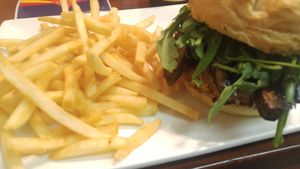 Tasty veggie burger with mushrooms and fries. at Lovin' Spoonfuls in Tucson
