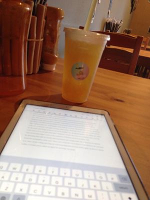 Green tea lychee with passion fruit boba and studying  at DrinkabiliTea Cafe in The Woodlands