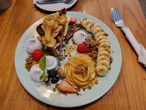 Vegan glutenfree waffle with Apple caramel crummble and seasonal fruits at Theera in Bangkok