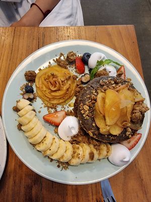 Vegan pancakes with Apple caramel crummble and seasonal fruits at Theera in Bangkok