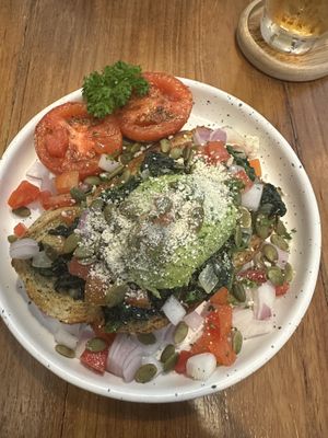 Toast with spinach and avocado   at Theera in Bangkok