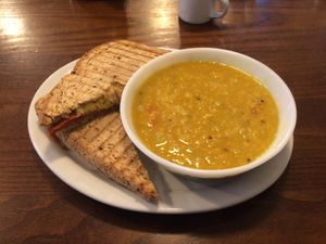 Dahl + vegan sandwich toasted (vegan cheese + vegan bacon inside) at The Little Potting Shed Cafe in Oban