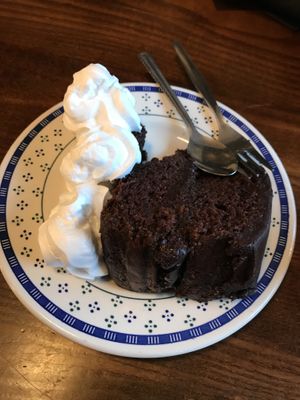 Vegan chocolate cake with vegan cream at The Little Potting Shed Cafe in Oban