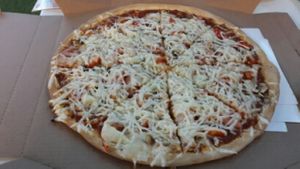 pizza with vegan cheese at Prego Pizza in Eilat