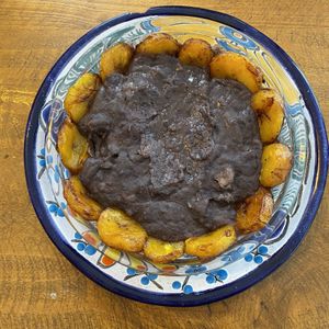 Beans with plantain at Suculenta in Tulum