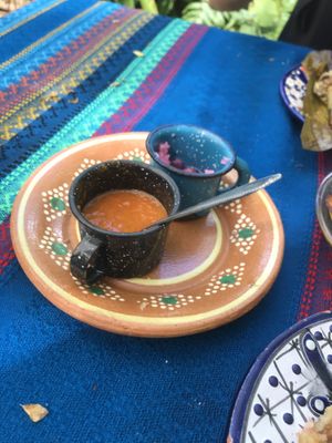 Sauces and pickled red onions  at Suculenta in Tulum