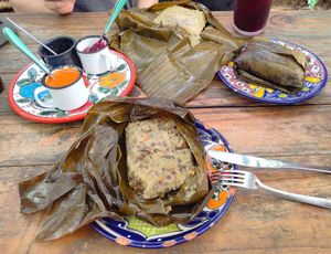 Different Tamales with hot sauce. Each 75 Pesos. at Suculenta in Tulum