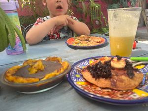 Banana bread and pancakes and beans a fried banana  at Suculenta in Tulum