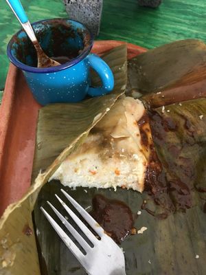 Vegan corn & carrot tamale with chocolate mole sauce at Suculenta in Tulum