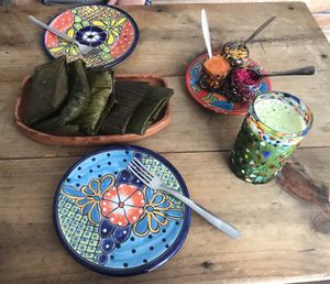 Selection of tamales to share with salads and green juice at Suculenta in Tulum