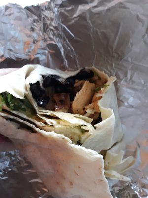 Faux steak burrito with vegan cheese & sour cream. SO tasty!! at Pelon's Baja Grill in Virginia Beach