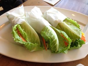 Spicy Thai Wraps: Mango, Cabbage, Carrot, Almond Cream, Fresh Herbs, Romaine  at Green Zebra Cafe in Sarasota