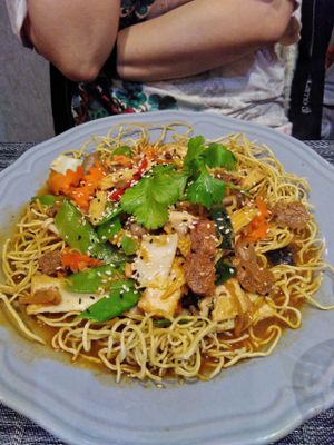 Noodles, vegetables and spicy tofu at Le P'tit Pré Chez Lan in Paris