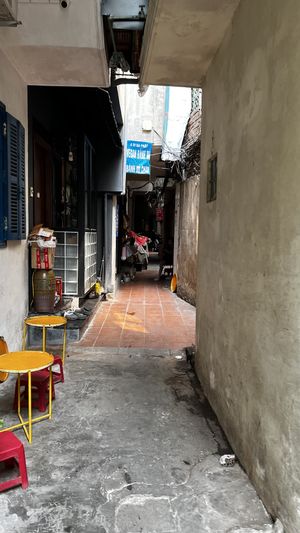 There‘s signs outside the alley, too.   at Bao An Vegan (formerly Vegan Banhmi) in Hanoi