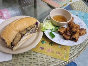 Shumai Tofu Ball Banh mi with Fried sSpring Rolls 😋 at Bao An Vegan (formerly Vegan Banhmi) in Hanoi