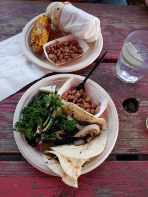 Burrito plate with corn and mushroom fajitas with salad. at La Botanica in San Antonio