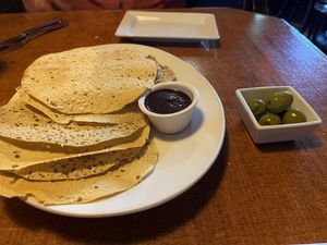 Poppadums and orange stuffed olives   at Aroma Thyme Bistro in Ellenville