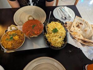 Aloo Gobi, (forgot the name), lemon rice and vegan naan at Gandhi Tandoori in St Pauls Bay