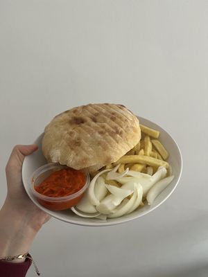 ćevapčići, lepinja, ajvar, onion and fries (i ordered this at home, so it’s mine terrible plating not theirs)  at Vege Fino Za Sve in Zagreb