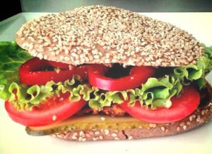 'Vegepurger' vegan burger in a whole wheat bun at Vege Fino Za Sve in Zagreb