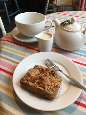 vegan plum and pecan slice and a pot of tea with soy milk at Word of Mouth in Evesham