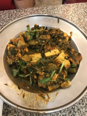Palak w/tofu.. not on menu but recommended by server. Comp to paneer masala! at Udupi Cafe in Tempe