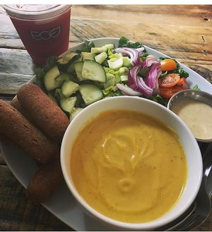 Rainbow salad, butternut squash soup, strawberry kombucha and vegan rosemary breadsticks  at Natural Living Food Co-op and Cafe in League City