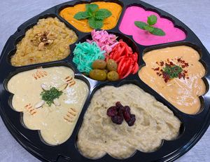 Multi flavored hummus and eggplant at Sauceeino in Boardman