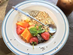 Oats porridge with coconut milk and fruit  at FatCat in Pai