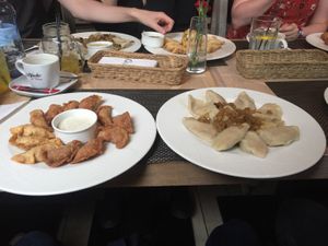 Deep-fried Pierogi with Vegan mayo / boiled Pierogi with onion (Vegan) at Pierogarnia Mandu Oliwa in Gdansk