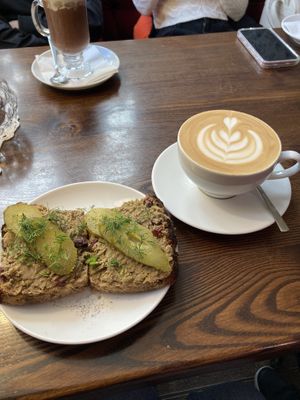 Vegan pate and pickle sandwich with an oat latte  at Retro in Gdansk