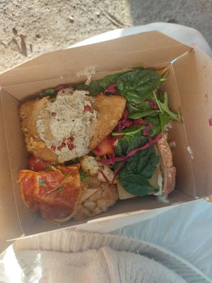 to go box from dinner buffet, some salad, seitan, lasagna, cauliflower, bread with tofu dip (there's more burried under there) at daTerra - Baixa in Porto