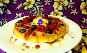 Vegetarian Waffle with edible flowers at LaniLove Gluten-Free Breads in Kahuku