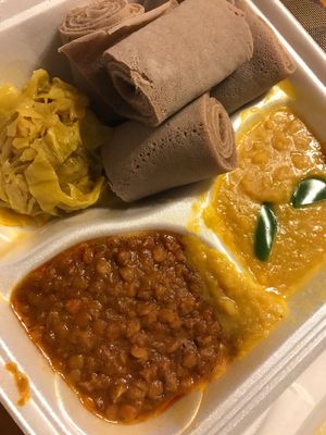 Red lentils, split peas, cabbage. Different flavors and mostly turmeric, ginger and garlic. I love it.  at Queen of Sheeba in West Palm Beach