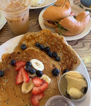 Vegan banana pancakes and vegan breakfast bagel with vegan egg,  vegan bacon   at Morning Brew - Kailua in Kailua