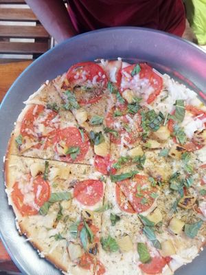 White pizza with 4 types of vegan cheese and pineapple at Big Kahuna's Pizza in Honolulu