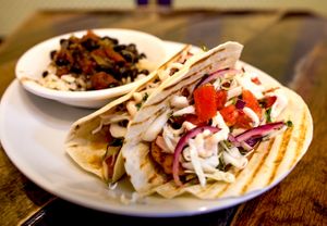 Shrimp Tacos-Local Royal Reds, cilantro lime slaw, pico, and spicy sour scream at Cultivate Cafe in Destin