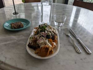 Festive Chilaquiles, Crispy Quinoa Bar at Cafe Gratitude in San Diego
