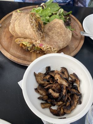 Mushroom bacon and Mission Burrito with mushroom carnitas at Cafe Gratitude at Cafe Gratitude in San Diego