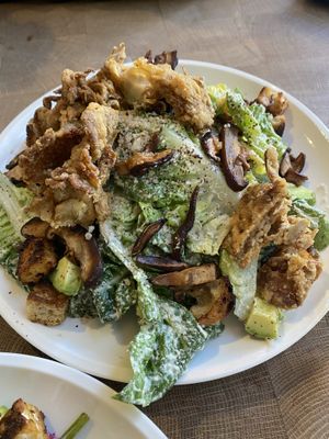 Ceaser with chicken fried mushrooms at Cafe Gratitude in San Diego