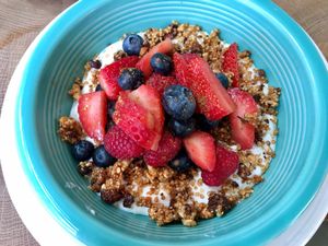 granola with fresh fruit and coconut yoghurt  at Cafe Gratitude in San Diego