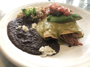 Jackfruit enchiladas  at Cafe Gratitude in San Diego
