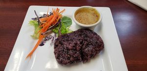 Delicious appetizer. Purple sticky rice with peanut sauce. at Na-Ha-Thai's Kitchen in Guelph