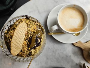 Pistachio spaghetti ice cream & oat Latte at Eisschmiede - Manufaktur fur Genuss in Dusseldorf