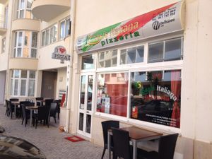 Outside at L'Oasis Italiana in Armacao De Pera