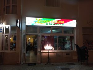 outside at night  at L'Oasis Italiana in Armacao De Pera