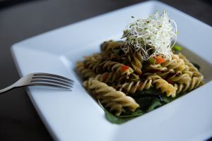Green fusilli pasta at Nümen in Merida