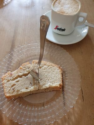 Lemon lavender cake and cappuccino at Cafe Leander in Bamberg